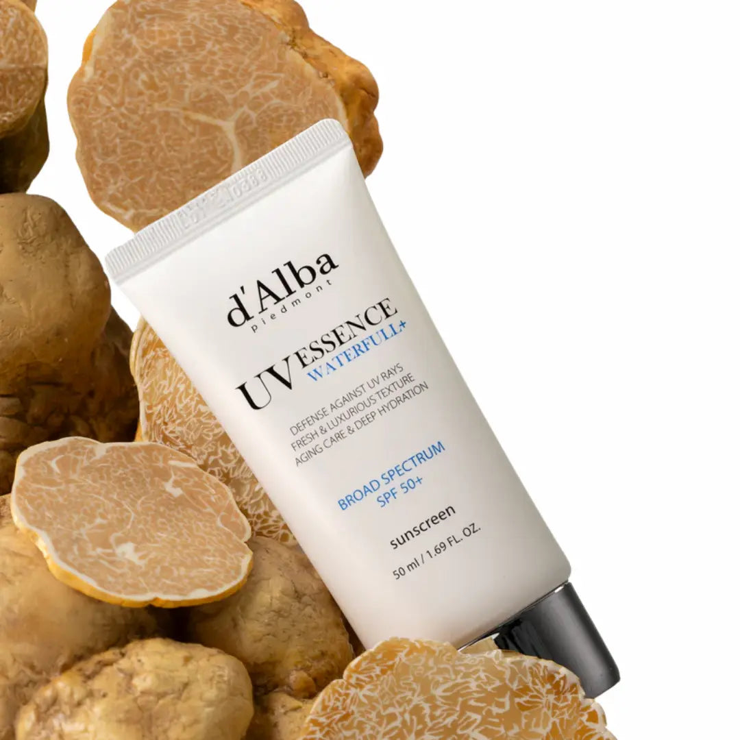 Applying d’Alba White Truffle Waterfull Essence Sunscreen SPF 50+ for a dewy glass skin finish